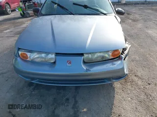 2002 Saturn SL z VIN 1G8ZH52892Z151119, wystawiony jako IAAI lot #41764757 z przebiegiem 82 017 mil mil oraz . Historia ofert i sprzedaży dostępna na DreamBid. Obrazek 12.