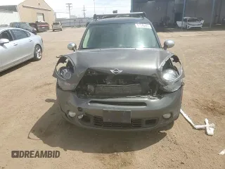 2013 MINI Countryman S ALL4 z VIN WMWZC5C56DWM16203, wystawiony jako Copart lot #54346425 z przebiegiem 148 065 mil mil oraz Szkoda całkowita • Salvage title. Historia ofert i sprzedaży dostępna na DreamBid. Obrazek 13.