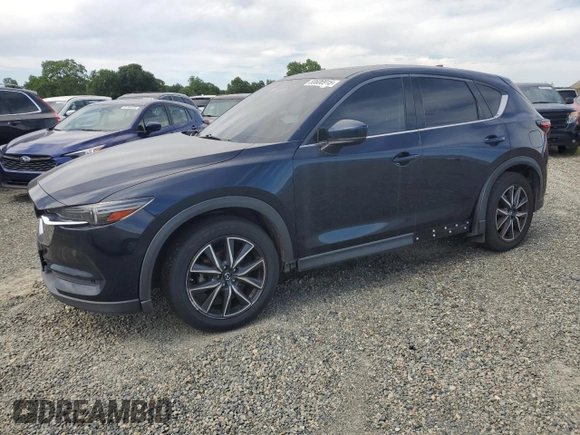 2017 Mazda CX-5 Grand Touring with VIN JM3KFADL2H0221149, listed as a Copart auction lot 50606915 with 140,518 mi miles and Clean Title. Bid and sale history available at carsss.com. Image 1.