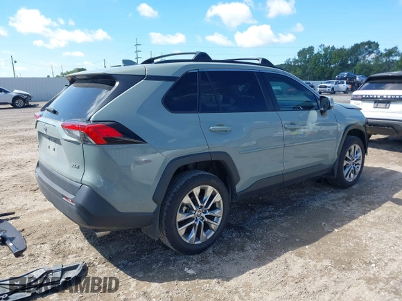 2021 Toyota RAV4 XLE Premium z VIN 2T3C1RFVXMW184382, wystawiony jako IAAI lot #40343908 z przebiegiem 58 594 mil mil oraz . Historia ofert i sprzedaży dostępna na DreamBid. Obrazek 4.
