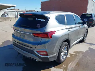 2019 Hyundai Santa Fe SE z VIN 5NMS23AD9KH037539, wystawiony jako IAAI lot #42221894 z przebiegiem 87 755 mil mil oraz . Historia ofert i sprzedaży dostępna na DreamBid. Obrazek 4.