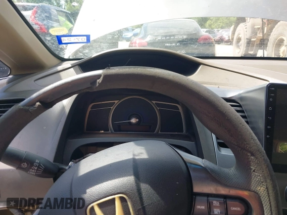 2006 Honda Civic LX z VIN 1HGFA16586L083119, wystawiony jako IAAI lot #42237313 z przebiegiem Nie podano mil oraz . Historia ofert i sprzedaży dostępna na DreamBid. Obrazek 7.
