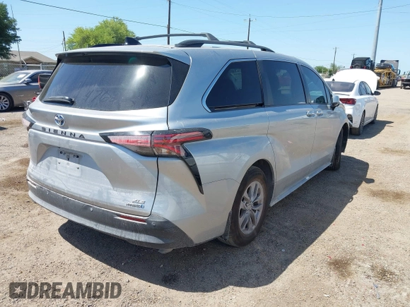 2021 Toyota Sienna XLE z VIN 5TDYRKEC1MS027959, wystawiony jako IAAI lot #42018160 z przebiegiem Nie podano mil oraz . Historia ofert i sprzedaży dostępna na DreamBid. Obrazek 4.