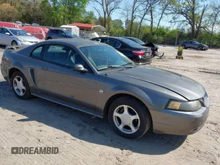 2004 Ford Mustang Standard z VIN 1FAFP40644F236905, wystawiony jako IAAI lot #42016081 z przebiegiem 167 733 mil mil oraz . Historia ofert i sprzedaży dostępna na DreamBid. Obrazek 1.