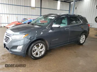 2020 Chevrolet Equinox Premier z VIN 3GNAXNEV8LS536085, wystawiony jako Copart lot #56329105 z przebiegiem 97 671 mil mil oraz Czysty tytuł • Clean title. Historia ofert i sprzedaży dostępna na DreamBid. Obrazek 1.