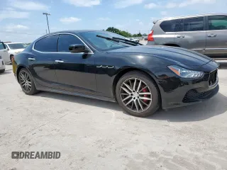 2014 Maserati Ghibli S Q4 with VIN ZAM57RTA8E1097777, listed as a Copart auction lot 59604665 with 86,135 mi miles and Salvage title. Bid and sale history available at DreamBid. Image 4.