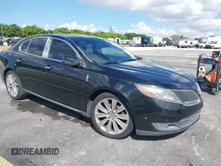 2013 Lincoln MKS EcoBoost with VIN 1LNHL9FT6DG603561, listed as a IAAI auction lot 41685618 with 103,989 mi miles. Bid and sale history available at carsss.com. Image 1.