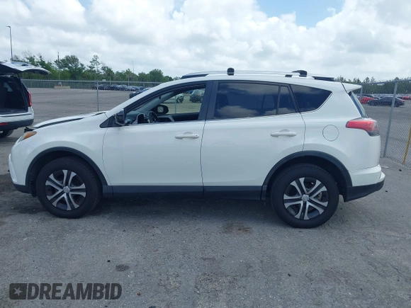 2016 Toyota RAV4 LE with VIN JTMZFREV2GJ096782, listed as a IAAI auction lot 41945319 with 76,866 mi miles. Bid and sale history available at carsss.com. Image 15.