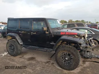 2013 Jeep Wrangler Unlimited Rubicon with VIN 1C4BJWFG2DL531203, listed as a IAAI auction lot 40729064 with 84,296 mi miles. Bid and sale history available at carsss.com. Image 13.