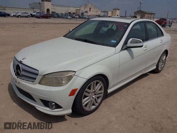 2009 Mercedes-Benz C-Class 3.0L Sport with VIN WDDGF54X39F200565, listed as a IAAI auction lot 42077156 with 169,248 mi miles. Bid and sale history available at carsss.com. Image 2.