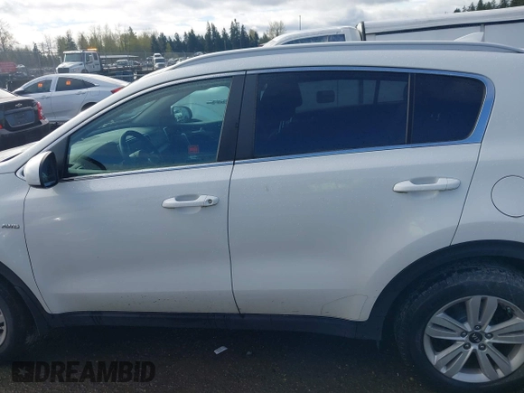 2017 Kia Sportage LX with VIN KNDPMCACXH7160726, listed as a IAAI auction lot 41974303 with 134,772 mi miles and . Bid and sale history available at DreamBid. Image 14.