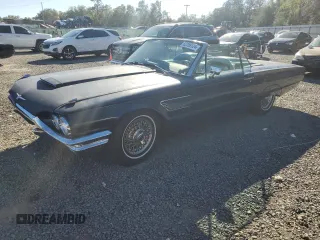 1965 Ford Thunderbird with VIN 5Y85Z115781, listed as a Copart auction lot 82289124 with 75,677 mi miles and Salvage Title. Bid and sale history available at DreamBid. Image 1.