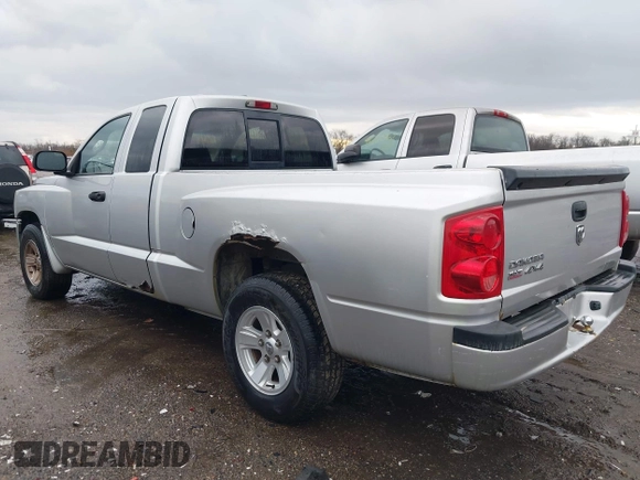 2008 Dodge Dakota SLT with VIN 1D7HW42KX8S560105, listed as a IAAI auction lot 41192410 with 99,097 mi miles and . Bid and sale history available at carsss.com. Image 3.