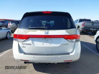 2014 Honda Odyssey Touring with VIN 5FNRL5H97EB037361, listed as a IAAI auction lot 42106742 with 198,279 mi miles and . Bid and sale history available at DreamBid. Image 16.