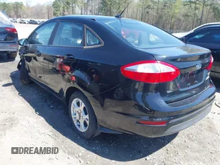 2016 Ford Fiesta SE with VIN 3FADP4BJ9GM144119, listed as a IAAI auction lot 41882179 with 122,048 mi miles. Bid and sale history available at carsss.com. Image 3.