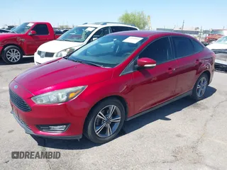 2017 Ford Focus SE with VIN 1FADP3FE3HL206074, listed as a IAAI auction lot 42594911 with 143,814 mi miles and . Bid and sale history available at DreamBid. Image 2.