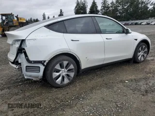 2023 Tesla Model Y Long Range z VIN 7SAYGDEE4PF836872, wystawiony jako Copart lot #45566235 z przebiegiem 7 674 mil mil oraz Szkoda całkowita • Salvage title. Historia ofert i sprzedaży dostępna na DreamBid. Obrazek 3.