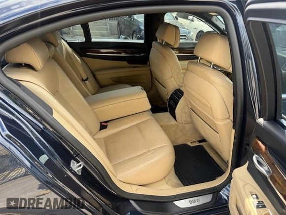 2015 BMW 7 Series 750i xDrive with VIN WBAYB6C5XFD965910, listed as a Copart auction lot 55407895 with 173,486 mi miles and Salvage Title. Bid and sale history available at carsss.com. Image 11.