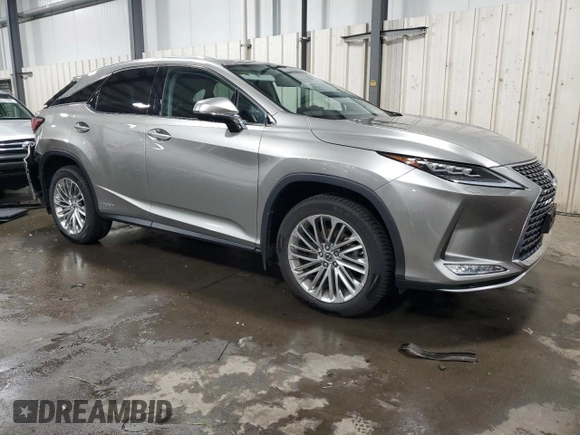 2020 Lexus RX 450h with VIN 2T2JGMDA8LC049608, listed as a Copart auction lot 58068145 with 67,935 mi miles and Salvage title. Bid and sale history available at DreamBid. Image 4.