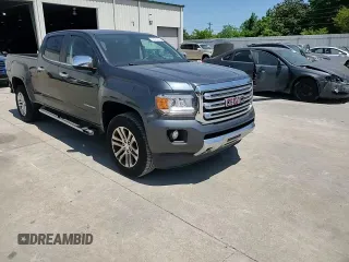 2015 GMC Canyon 4WD SLT z VIN 1GTG6CE30F1182562, wystawiony jako Copart lot #55382605 z przebiegiem 97 183 mil mil oraz Szkoda całkowita • Salvage title. Historia ofert i sprzedaży dostępna na DreamBid. Obrazek 13.