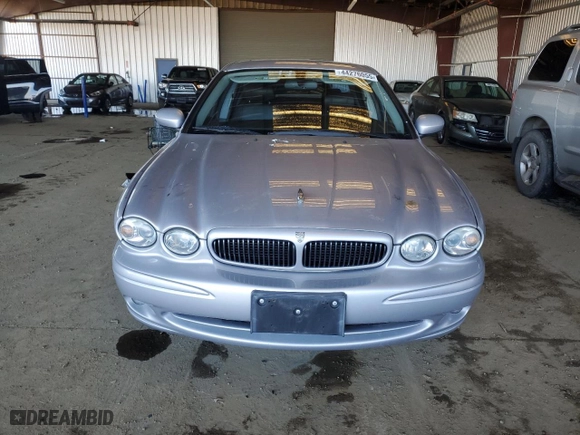 2002 Jaguar X-Type w/Sport Pkg with VIN SAJEA53D42XC61953, listed as a Copart auction lot 44276055 with NaN miles and Clean Title. Bid and sale history available at carsss.com. Image 5.