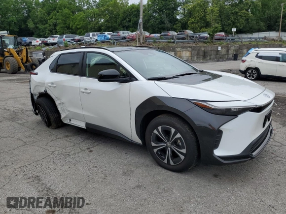 2024 Toyota bZ4X XLE with VIN JTMABACA2RA087660, listed as a Copart auction lot 61295995 with 2,288 mi miles and Salvage title. Bid and sale history available at DreamBid. Image 4.
