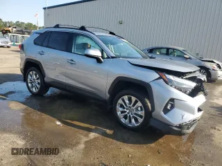 2025 Toyota RAV4 XLE Premium with VIN 2T3C1RFV2SC308112, listed as a Copart auction lot 52308415 with 11,179 mi miles and Salvage title. Bid and sale history available at DreamBid. Image 4.