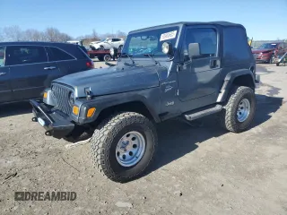 2002 Jeep Wrangler Sport with VIN 1J4FA49S22P703610, listed as a Copart auction lot 50900605 with 70,045 mi miles and Salvage Title. Bid and sale history available at carsss.com. Image 1.