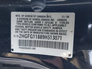 2009 Honda Civic Cpe EX with VIN 2HGFG11889H513071, listed as a IAAI auction lot 41233682 with 148,404 mi miles. Bid and sale history available at carsss.com. Image 9.