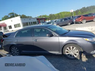2012 Toyota Avalon with VIN 4T1BK3DB1CU471826, listed as a IAAI auction lot 42020322 with 198,671 mi miles and . Bid and sale history available at DreamBid. Image 13.