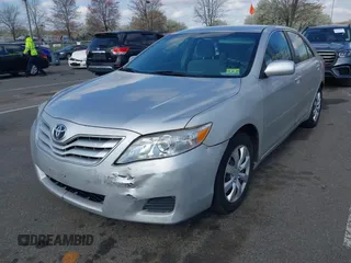 2011 Toyota Camry LE with VIN 4T1BF3EK4BU192114, listed as a IAAI auction lot 42014859 with 147,582 mi miles and . Bid and sale history available at carsss.com. Image 2.