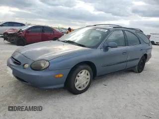 1999 Ford Taurus SE with VIN 1FAFP58U6XG294960, listed as a Copart auction lot 81061404 with 143,199 mi miles and Salvage title. Bid and sale history available at DreamBid. Image 1.