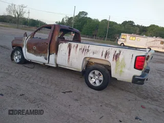 2014 Chevrolet Silverado 1500 with VIN 1GCNCREH7EZ137584, listed as a IAAI auction lot 41925804 with Not Provided miles and . Bid and sale history available at DreamBid. Image 3.