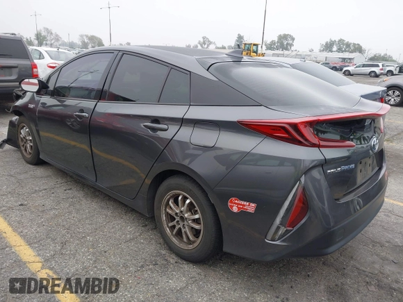 2018 Toyota Prius Plus with VIN JTDKARFP5J3095377, listed as a IAAI auction lot 42153552 with 77,255 mi miles and . Bid and sale history available at DreamBid. Image 3.