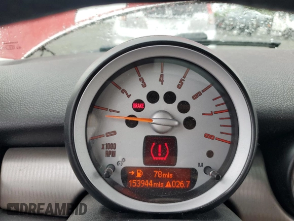 2007 MINI Hardtop S with VIN WMWMF73507TL86439, listed as a Copart auction lot 56500525 with 153,944 mi miles and Salvage title. Bid and sale history available at DreamBid. Image 9.