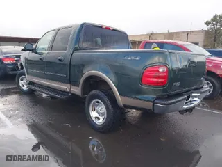2001 Ford F-150 SuperCrew XLT with VIN 1FTRW08W41KA63428, listed as a IAAI auction lot 41565419 with 181,557 mi miles. Bid and sale history available at carsss.com. Image 3.
