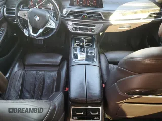 2016 BMW 7 Series 740i с VIN WBA7E2C51GG503912, выставлен на аукционе Copart как лот 47464895 с пробегом 160 322 миль миль и Списание • Salvage title. История ставок и продаж доступна на DreamBid. Изображение 8.