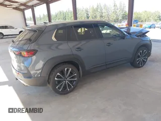 2023 Mazda CX-50 Premium Plus with VIN 7MMVABEY8PN100311, listed as a IAAI auction lot 42626276 with 40,242 mi miles and . Bid and sale history available at DreamBid. Image 4.
