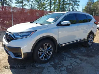 2021 Honda CR-V Touring with VIN 7FARW1H99ME012061, listed as a IAAI auction lot 41168036 with 36,886 mi miles. Bid and sale history available at carsss.com. Image 2.