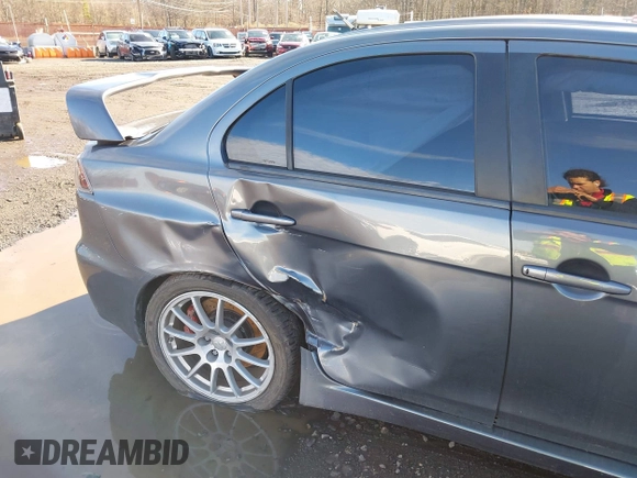 2008 Mitsubishi Lancer Evolution GSR with VIN JA3AW86V18U044077, listed as a IAAI auction lot 41208625 with 157,788 mi miles. Bid and sale history available at carsss.com. Image 19.