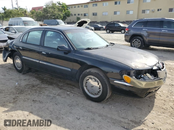 1998 Lincoln Continental with VIN 1LNFM97V8WY742639, listed as a Copart auction lot 82138303 with 268,814 mi miles and Salvage Title. Bid and sale history available at carsss.com. Image 4.