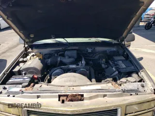 1999 GMC Suburban with VIN 3GKFK16R2XG530190, listed as a Copart auction lot 68385684 with 131,021 mi miles and Salvage Title. Bid and sale history available at carsss.com. Image 12.
