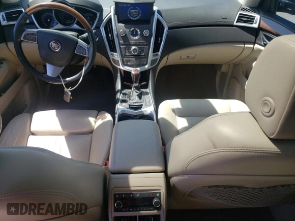 2011 Cadillac SRX Premium Collection with VIN 3GYFNCEY4BS570181, listed as a Copart auction lot 53244915 with 53,738 mi miles and Salvage title. Bid and sale history available at DreamBid. Image 8.