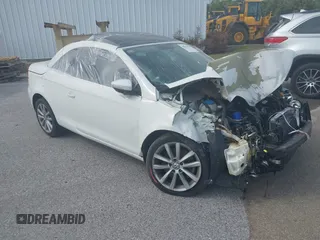 2012 Volkswagen Eos Komfort with VIN WVWBW7AH9CV017620, listed as a IAAI auction lot 40945479 with 96,444 mi miles and . Bid and sale history available at DreamBid. Image 1.
