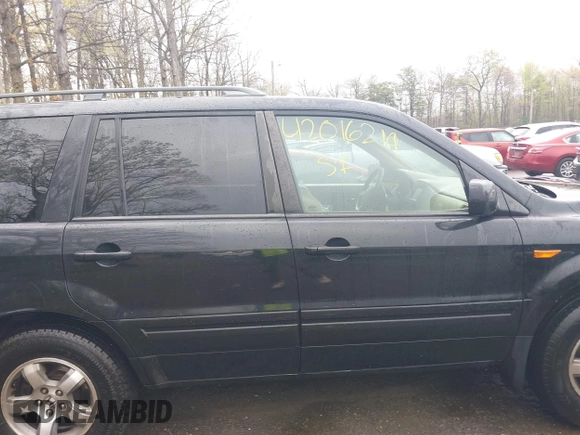 2006 Honda Pilot EX-L with VIN 5FNYF18776B021690, listed as a IAAI auction lot 42016219 with 239,666 mi miles and . Bid and sale history available at DreamBid. Image 13.
