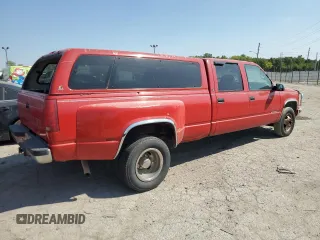1999 Chevrolet Silverado 3500 z VIN 1GCHC33J3XF055520, wystawiony jako Copart lot #71958374 z przebiegiem 242 976 mil mil oraz Tytuł czysty. Historia ofert i sprzedaży dostępna na DreamBid. Obrazek 3.