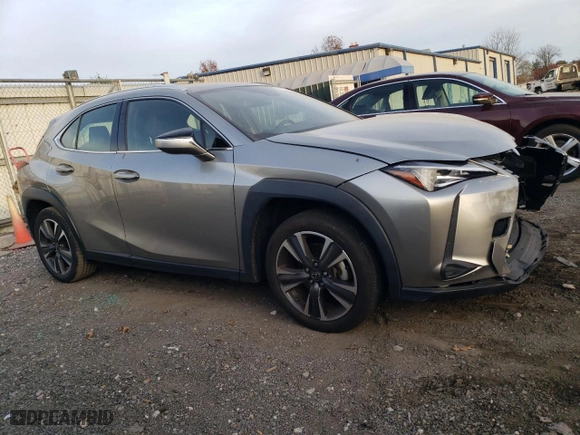 2022 Lexus UX with VIN JTHX3JBHXN2048498, listed as a Copart auction lot 78983164 with 20,032 mi miles and Salvage Title. Bid and sale history available at carsss.com. Image 4.