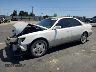 2000 Lexus ES 300 with VIN JT8BF28G4Y0281296, listed as a Copart auction lot 61225665 with Not provided miles and Salvage title. Bid and sale history available at DreamBid. Image 1.
