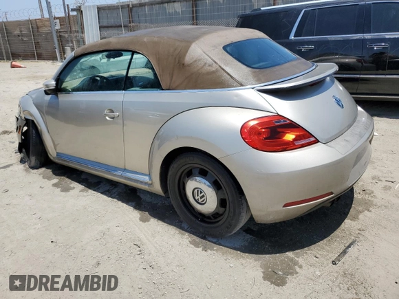 2014 Volkswagen Beetle 1.8T with VIN 3VW517AT9EM820812, listed as a Copart auction lot 61730685 with 85,571 mi miles and Clean title. Bid and sale history available at DreamBid. Image 2.