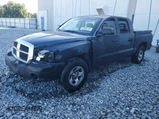 2007 Dodge Dakota ST z VIN 1D3HW28P17S173529, wystawiony jako Copart lot #51895125 z przebiegiem 257 626 mil mil oraz Szkoda całkowita • Salvage title. Historia ofert i sprzedaży dostępna na DreamBid. Obrazek 1.